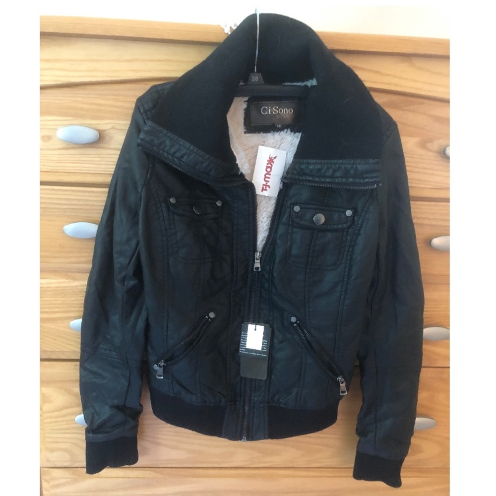 Leather with soft fake fur lining.